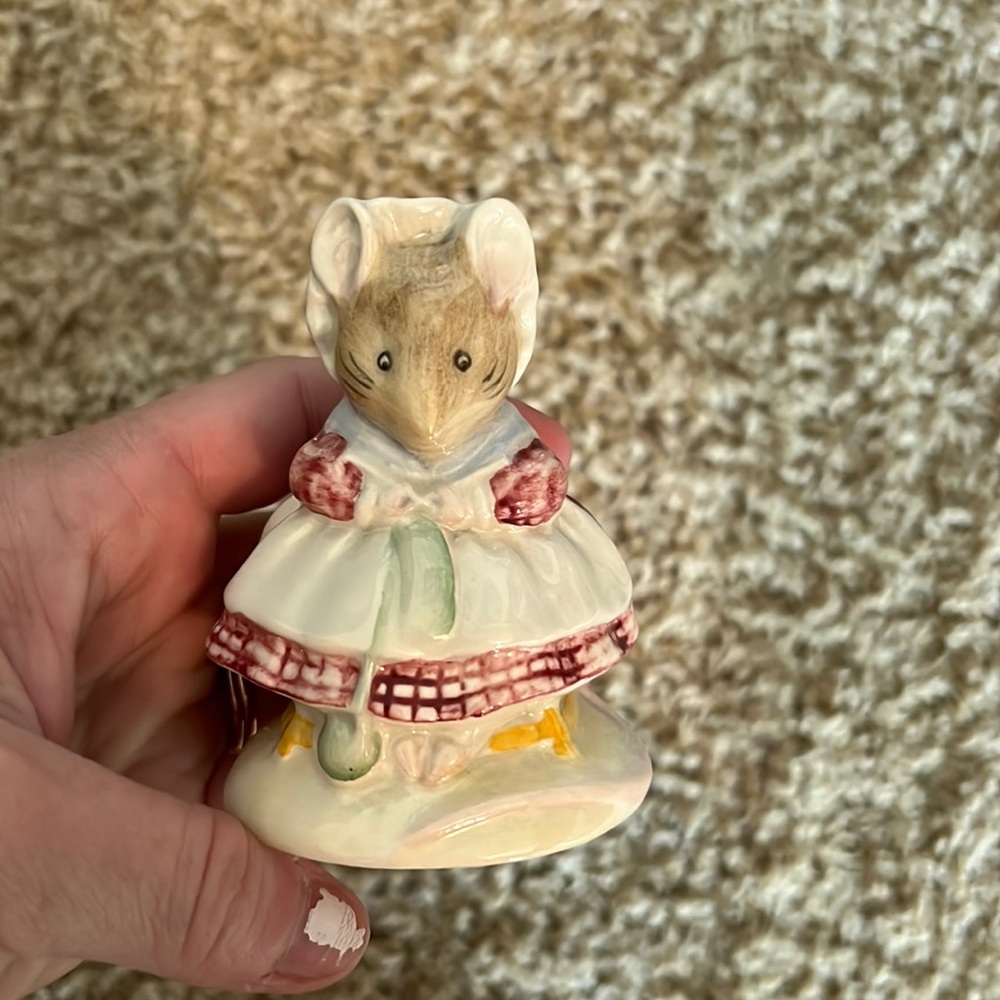 Beatrix Potter figurine- “the old woman who lived in a shoe knitting”